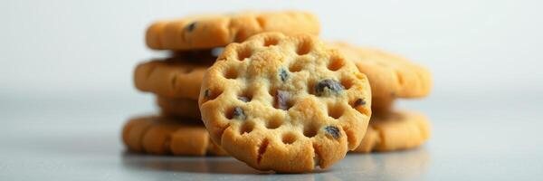 Freshly baked cookies arranged neatly on a clean surface, invitingly golden brown with chocolate chips photo