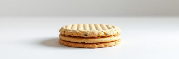 Freshly baked round cookies stacked on a plain surface ready to be enjoyed for snacks or desserts photo