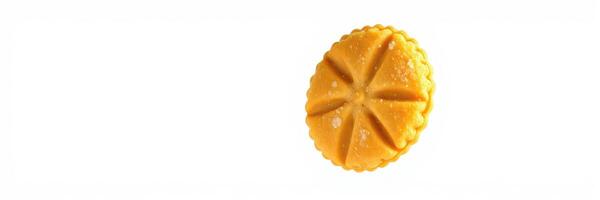 Delicious round pastry with a shiny glaze resting on a clean surface photo