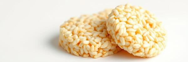 Crispy rice cakes stacked on a clean white surface ready for healthy snacking and meal preparation photo