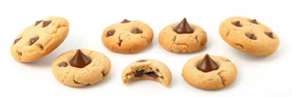 Chocolate chip cookies arranged on a white background with one cookie bitten into, showcasing the melted chocolate photo