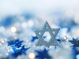 Sparkling Hanukkah star of David on glittering blue background for festive holiday design photo
