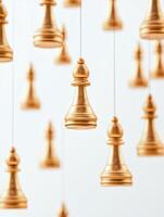 Floating golden pawns in mid air. Abstract concept of strategy and balance photo