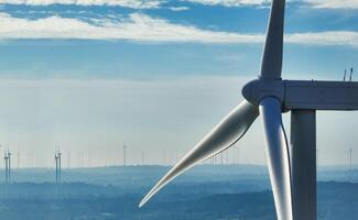 Wind energy. Wind power. Sustainable, renewable energy. Wind turbines generate electricity. Wind farm. Sustainable resources. Sustainable development. Green technology for energy sustainability. photo