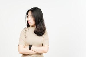 Folding arms with Angry Face Expression Of Beautiful Asian Woman Isolated On White Background photo