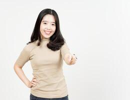 Smiling and Pointing to Camera Of Beautiful Asian Woman Isolated On White Background photo