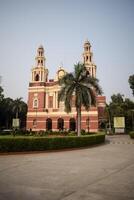 Sacred Heart Cathedral Church located at Connaught Place, Delhi, India, Beautiful architectural view from outside of Cathedral Church in Central Delhi during evening time photo