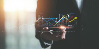 Businessman showing business growth and success graph ,concept of progress in development, financial efficiency and investment with business strategy for goals and opportunities in industry future photo
