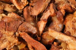 a close up of a pile of meat on a plate photo