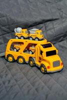 a toy truck with a trailer on it photo