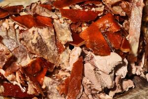 a close up of a piece of meat on a plate photo