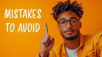 Mistakes to avoid message with a young man on orange background. Conceptual mistakes to avoid symbol. photo