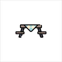 A picnic table with a blanket on it vector