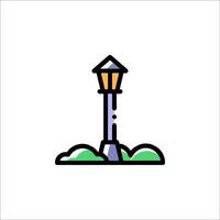 A street light with a green grass and a tree vector