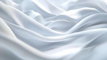 White fabric with a pattern of dots and lines. The fabric is very smooth and has a very soft texture photo