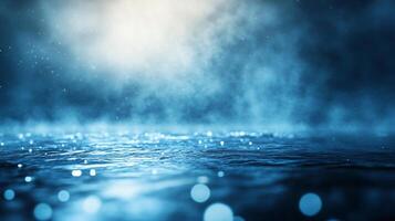 Blue sky with a misty haze and water droplets. The water droplets are scattered throughout the sky, creating a sense of movement and fluidity photo