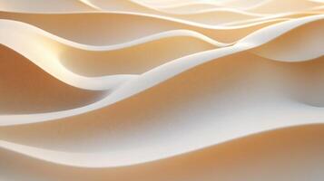 The image is a close up of a sandy beach with a wave pattern. The sand is white and the waves are small. Scene is calm and peaceful, as the beach appears to be deserted photo