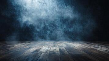 Dark room with a wooden floor and a wall with a blue background. The room is empty and has a mysterious atmosphere photo