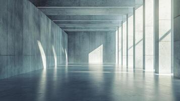 Large, empty room with a lot of light shining through the windows. The room is made of concrete and has a very modern feel to it photo