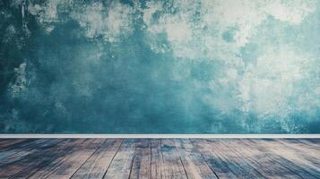 Blue wall with a wooden floor. The wall is covered in a textured paint that gives it a rough, unfinished look. The floor is made of wood and has a natural, rustic feel to it photo