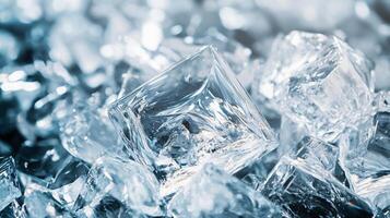 Pile of ice cubes with a clear, almost glassy appearance. The cubes are scattered and appear to be melting, creating a sense of movement and change. The image evokes a feeling of coldness photo