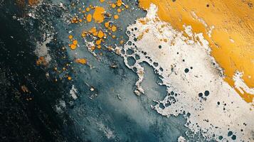 Painting with a blue and yellow background and white splatters. The splatters are in different sizes and shapes, and the painting has a sense of chaos and disorder photo