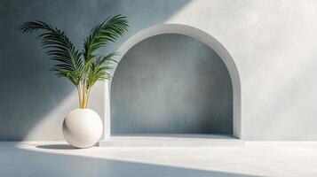 White vase with a green plant in it sits in front of a gray archway. The vase and plant create a sense of calm and serenity in the room photo