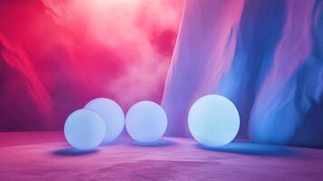 Group of four glowing spheres are placed on a snowy surface. The spheres are lit up and appear to be floating in the air. The scene has a surreal and dreamlike quality, with the bright colors photo