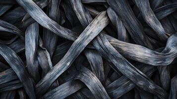 The image is of a bunch of blue and white strings. The strings are twisted and tangled, creating a sense of chaos and disorder. Scene is somewhat unsettling and disordered photo