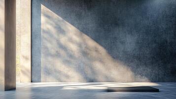 Large, empty room with a wall of concrete and a pillar in the middle. The room is illuminated by sunlight, creating a stark and stark atmosphere photo