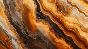 Painting of a rock wall with a gold and brown color scheme. The painting has a textured look to it, with the colors blending together to create a sense of depth and movement photo