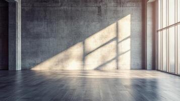 Large, empty room with a window that lets in sunlight. The room is bare and empty, with no furniture or decorations. The sunlight shining through the window casts a warm glow on the walls and floor photo