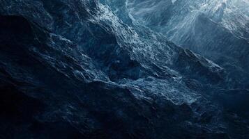 The image is of a large body of water with waves crashing against the shore. The water is dark blue and he is rough, with foam and spray visible. Scene is one of power and intensity photo