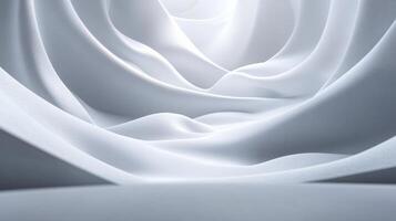 White fabric with a pattern of squares and triangles. The fabric is folded and rolled up, creating a sense of movement and texture. The image evokes a feeling of calmness and serenity photo