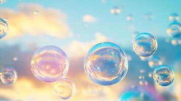 Group of colorful bubbles floating in the air. The bubbles are of various sizes and are scattered throughout the scene, creating a sense of movement and playfulness. Scene is lighthearted and joyful photo