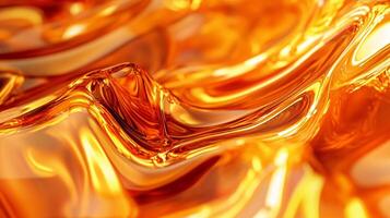 Close up of a yellow liquid with a wave pattern. The liquid appears to be honey or some other type of syrup. The image has a warm, inviting feeling to it, as if it were a delicious treat photo