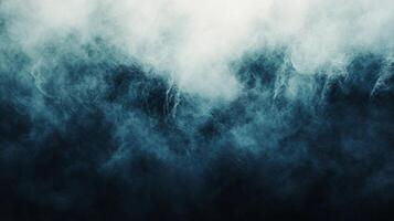The image is a blue and white background with a lot of white clouds. The sky is filled with white clouds and the water is blue. The sky is very cloudy and the water is choppy photo