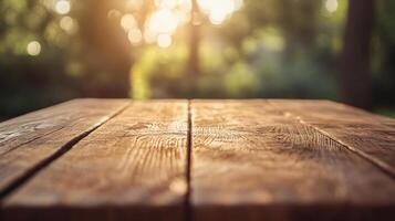 Wooden table with a view of trees and sunlight. The table is empty and the view is of a forest photo