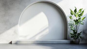White archway with a plant in a pot is placed in a room. The archway is empty, and the plant is in a pot, adding a touch of greenery to the space. The room is likely a modern photo