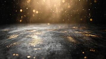 Black and gold background with a lot of sparkles. The background is a dark color and the sparkles are gold photo