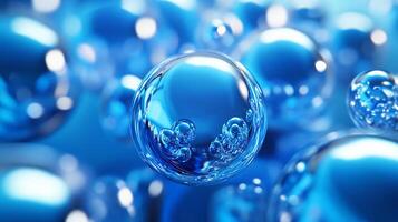 Close up of many small blue spheres. The spheres are all the same size and are floating in a blue liquid. Concept of calm and tranquility, as the blue liquid and spheres create a peaceful photo