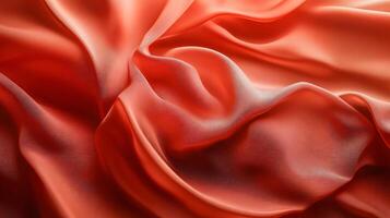 Red fabric with a pattern of lines and dots. The fabric is folded and has a rough texture photo