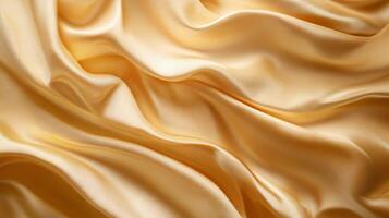 Gold fabric with a wave pattern. The fabric is very soft and smooth. The color of the fabric is warm and inviting photo