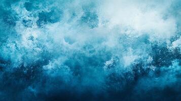 The sky is a beautiful shade of blue with white clouds scattered throughout. In the middle of the sky, there is a splash of blue that stands out against the blue backdrop. The clouds are fluffy photo