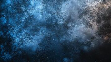 The sky is a deep blue color with a few white clouds scattered throughout. The stars are small and twinkling, adding a sense of wonder and magic to the scene photo