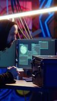 Vertical Hacker leaving secret base with suitcase full of money and stolen data obtained from victim after blackmailing with ransomware. Cybercriminal finishing criminal plan, exiting basement, camera B video