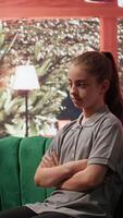 Therapy session with a teenage girl discussing trauma and behavioral problems. Psychotherapist supporting her emotional development, guiding her through depression and anxiety. Camera B. video