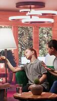 Mom bringing her disconnected teenager at a therapy session with psychiatrist, adolescent girl suffering from depersonalization and dissociation from reality. Mother struggling to help. Camera B. video