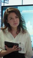 Vertical General manager and investors gathering for an investment fair meeting, discussing potential growth opportunities. Business staff reviewing financial projections and strategic initiatives. Camera A. video