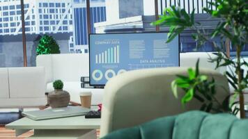 Empty modern office setup with advanced technology enhances productivity, helping professionals focus on financial strategies, performance metrics and global business objectives. video